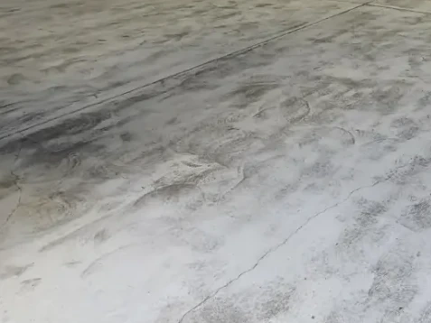 Concrete Masters v2 Worn distribution center concrete floor before epoxy coating