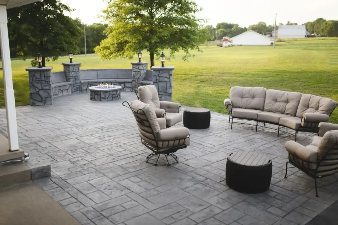 Concrete Masters v2 Stamped concrete patio with ashlar slate pattern and warm brown stain in Sandy Springs, Georgia